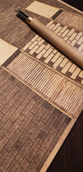 Woodcut print in the process of being made